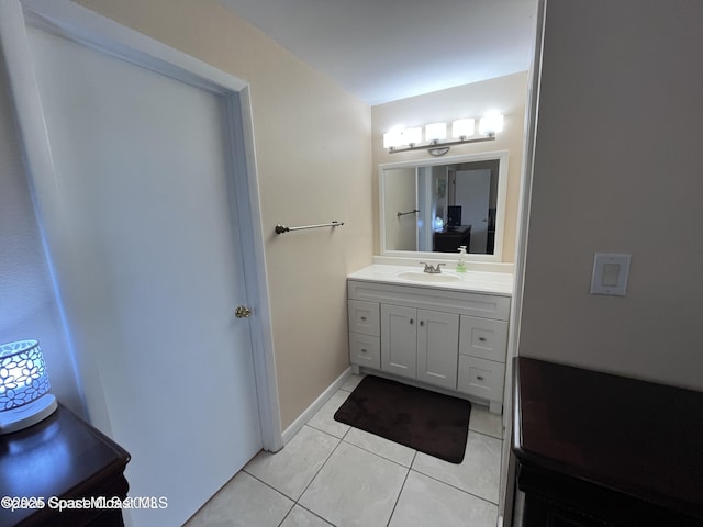 201 Saint Lucie Ln Unit 309, Cocoa Beach, FL 32931 - bathroom with vanity and tile patterned floors