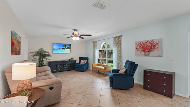 4060 Aria Dr, Melbourne, FL 32904 - living area featuring ceiling fan and light tile patterned floors