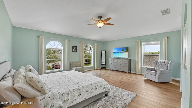 4060 Aria Dr, Melbourne, FL 32904 - bedroom featuring multiple windows, wood finished floors, and a ceiling fan
