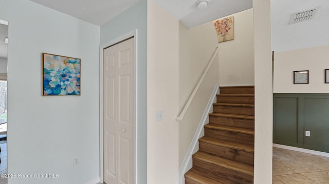 4060 Aria Dr, Melbourne, FL 32904 - staircase with tile patterned flooring