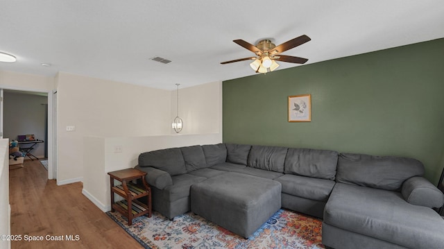 4060 Aria Dr, Melbourne, FL 32904 - living room featuring wood finished floors and ceiling fan