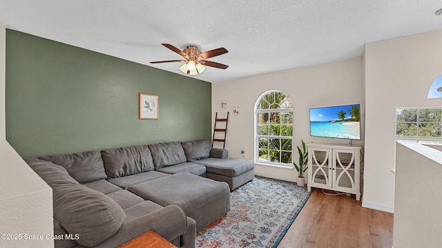 4060 Aria Dr, Melbourne, FL 32904 - living area featuring a ceiling fan and wood finished floors