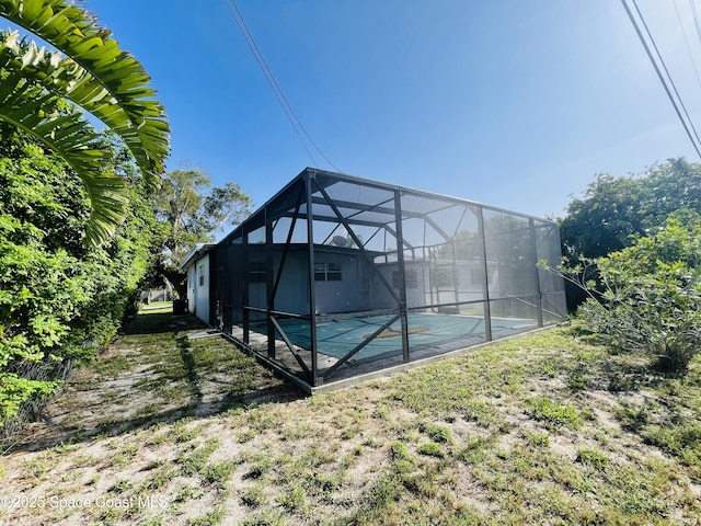 235 NE 2nd St, Satellite Beach, FL 32937 - swimming pool with glass enclosure