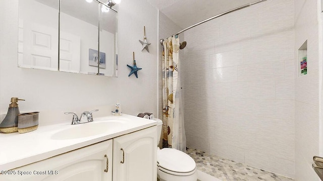 210 Cleveland Ave Unit 210, Cocoa Beach, FL 32931 - bathroom with vanity and tiled shower