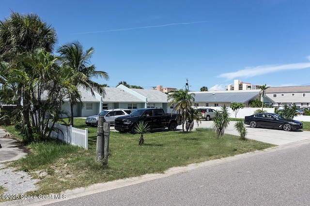 212 Cleveland Ave Unit 212, Cocoa Beach, FL 32931 - view of front facade with a residential view