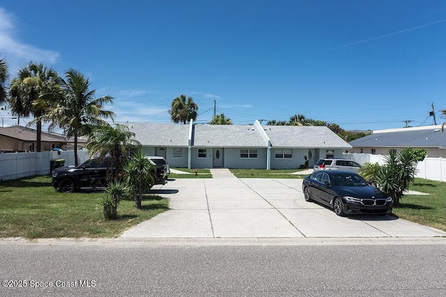 212 Cleveland Ave Unit 212, Cocoa Beach, FL 32931 - ranch-style home with concrete driveway