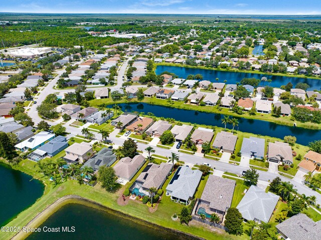 1137 White Oak Cir, Melbourne, FL 32934 - aerial view of property's location featuring nearby suburban area and a large body of water