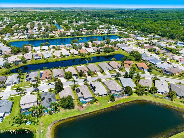 1137 White Oak Cir, Melbourne, FL 32934 - aerial view of property and surrounding area with nearby suburban area and a large body of water