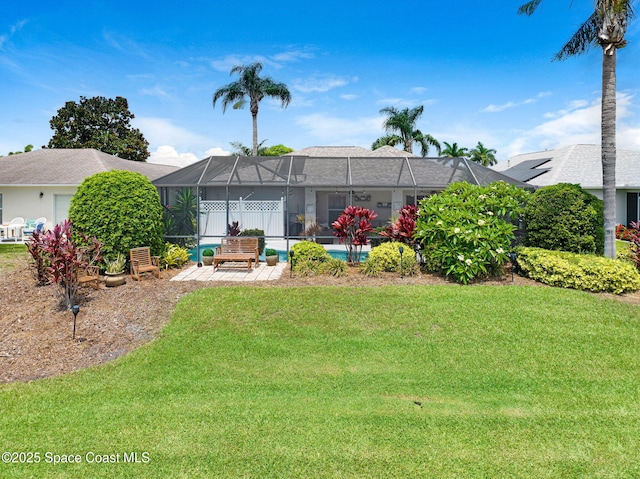 1137 White Oak Cir, Melbourne, FL 32934 - back of property with a lawn, a lanai, and a patio