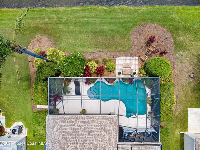 1137 White Oak Cir, Melbourne, FL 32934 - drone / aerial view of a pool area