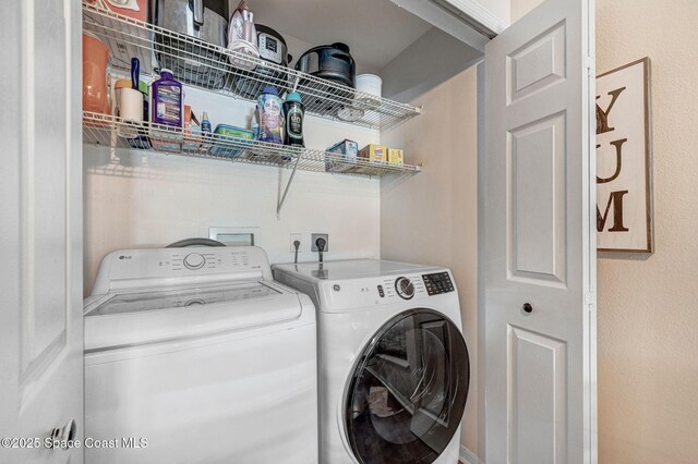 1137 White Oak Cir, Melbourne, FL 32934 - laundry room with separate washer and dryer