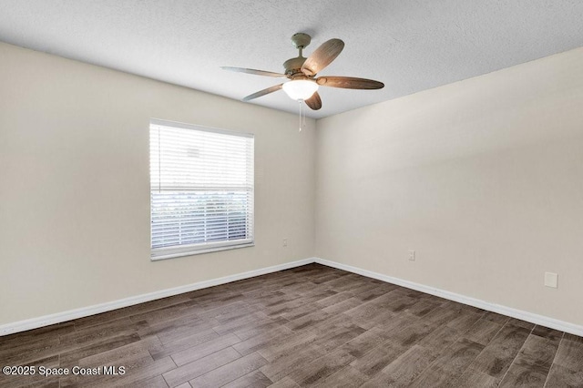 461 Coply Ter, Sebastian, FL 32958 - empty room with wood finished floors, a textured ceiling, and a ceiling fan