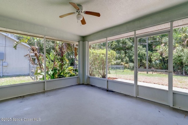 461 Coply Ter, Sebastian, FL 32958 - unfurnished sunroom featuring ceiling fan and plenty of natural light