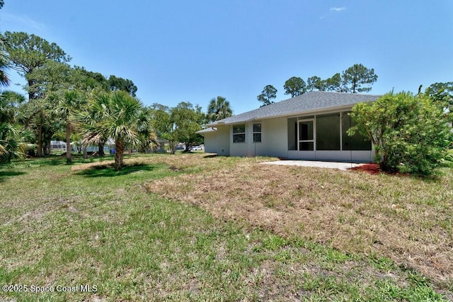461 Coply Ter, Sebastian, FL 32958 - view of green lawn featuring a sunroom