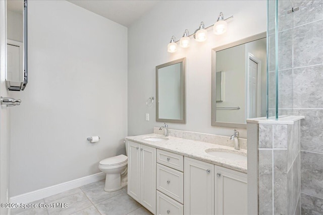 608 Lorelei Ave, Melbourne, FL 32901 - bathroom with double vanity, tile patterned flooring, and a tile shower