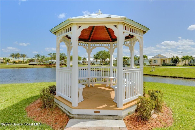608 Lorelei Ave, Melbourne, FL 32901 - deck featuring a gazebo, a water view, and a yard