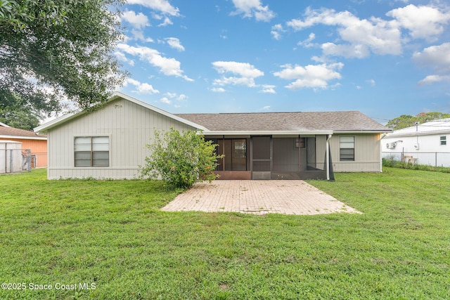 1337 Pakenham St NW, Palm Bay, FL 32907 - back of property with a sunroom and a patio area