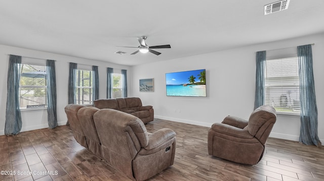 6830 Harp Ave, Cocoa, FL 32927 - living area with wood finished floors and ceiling fan