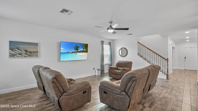 6830 Harp Ave, Cocoa, FL 32927 - living room with stairs, wood finished floors, ceiling fan, and recessed lighting
