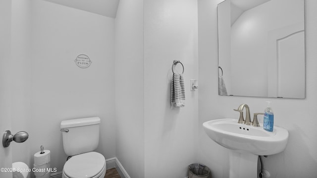 6830 Harp Ave, Cocoa, FL 32927 - bathroom with toilet and a sink