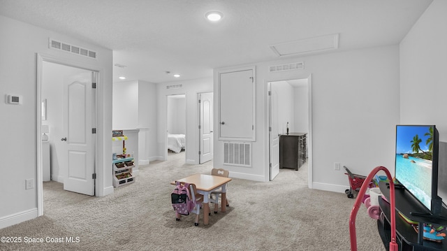 6830 Harp Ave, Cocoa, FL 32927 - game room featuring carpet floors, recessed lighting, and attic access