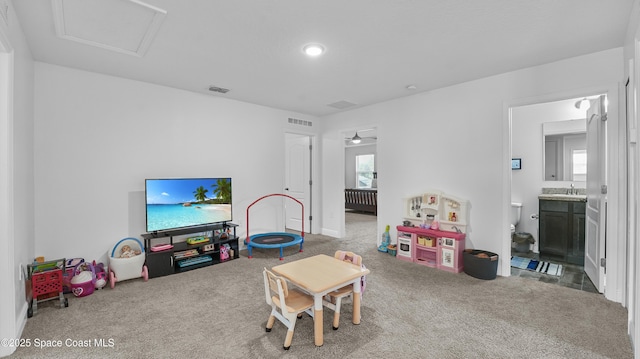 6830 Harp Ave, Cocoa, FL 32927 - rec room with carpet floors and a sink