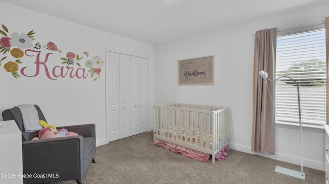 6830 Harp Ave, Cocoa, FL 32927 - bedroom with carpet floors, a closet, and a nursery area