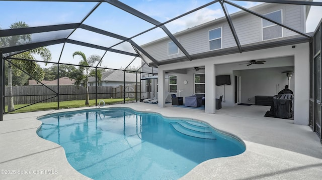 6830 Harp Ave, Cocoa, FL 32927 - view of pool featuring a patio area, a ceiling fan, and a lanai