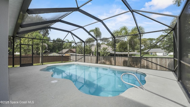 6830 Harp Ave, Cocoa, FL 32927 - view of swimming pool with a fenced backyard, a patio area, and glass enclosure