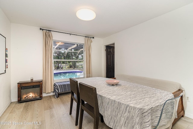 4685 Sand Point Rd, Grant, FL 32949 - dining space with light wood-type flooring and baseboards