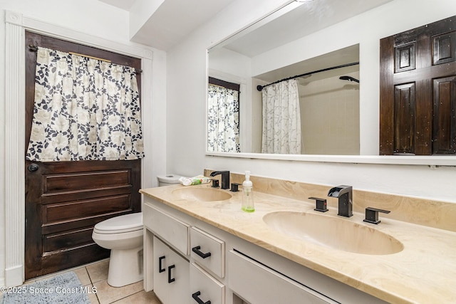 4685 Sand Point Rd, Grant, FL 32949 - full bath featuring double vanity, tile patterned flooring, and a shower with shower curtain