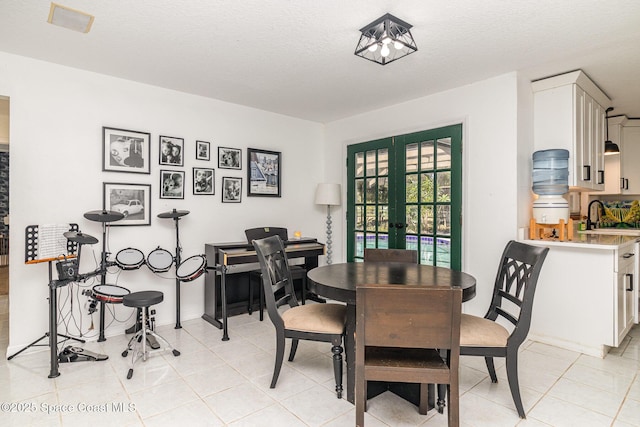 4685 Sand Point Rd, Grant, FL 32949 - dining room with french doors and light tile patterned floors