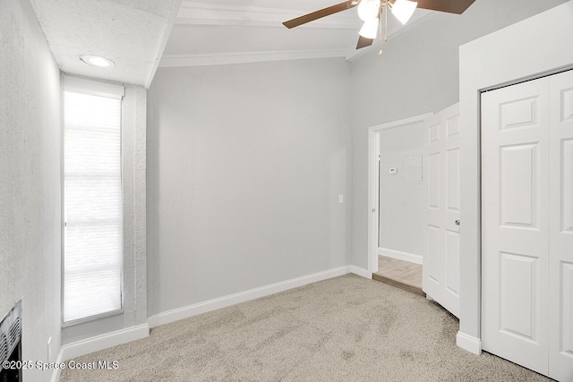 1256 16th Ave SW, Vero Beach, FL 32962 - carpeted empty room featuring ceiling fan, crown molding, and plenty of natural light