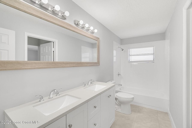 1256 16th Ave SW, Vero Beach, FL 32962 - bathroom featuring double vanity, a textured ceiling, shower / bath combination, and tile patterned floors