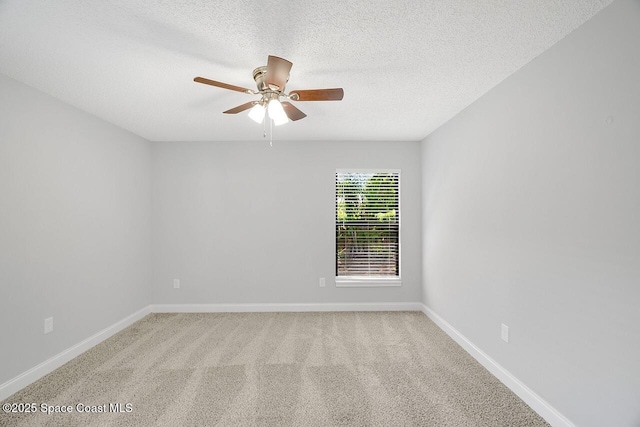1256 16th Ave SW, Vero Beach, FL 32962 - carpeted empty room featuring ceiling fan and a textured ceiling
