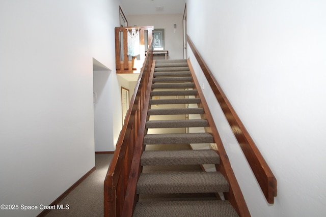 9027 Manchester Ln Unit 22F, West Melbourne, FL 32904 - stairway featuring carpet floors and baseboards