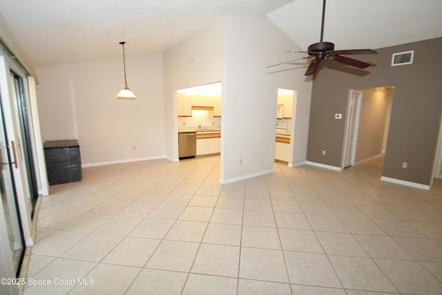 9027 Manchester Ln Unit 22F, West Melbourne, FL 32904 - unfurnished living room with ceiling fan, high vaulted ceiling, and light tile patterned floors
