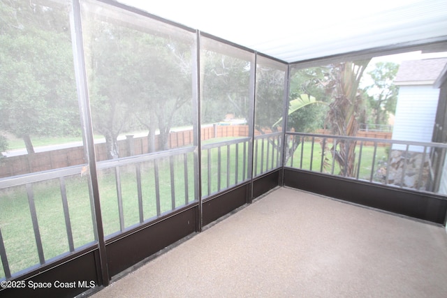 9027 Manchester Ln Unit 22F, West Melbourne, FL 32904 - unfurnished sunroom featuring carpet