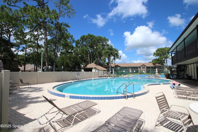 9027 Manchester Ln Unit 22F, West Melbourne, FL 32904 - community pool with a patio area