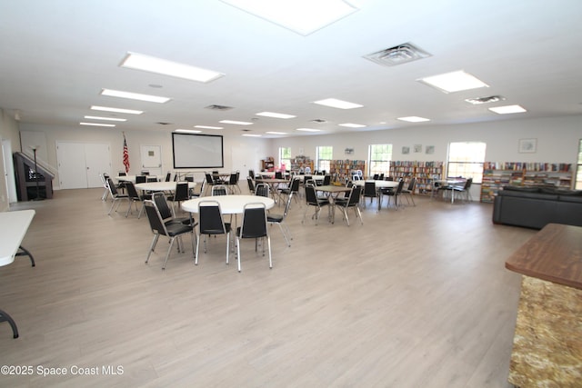 9027 Manchester Ln Unit 22F, West Melbourne, FL 32904 - dining area featuring light wood finished floors
