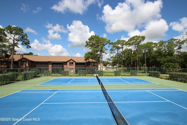 9027 Manchester Ln Unit 22F, West Melbourne, FL 32904 - view of tennis court with community basketball court