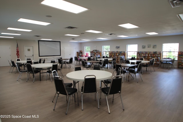 9027 Manchester Ln Unit 22F, West Melbourne, FL 32904 - dining room with light wood-style floors