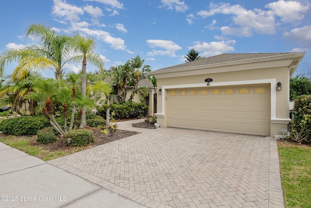 1869 Tullagee Ave, Melbourne, FL 32940 - garage with decorative driveway