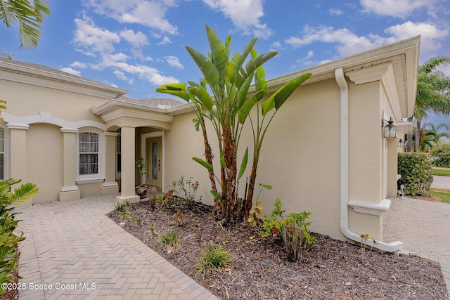 1869 Tullagee Ave, Melbourne, FL 32940 - property entrance featuring stucco siding