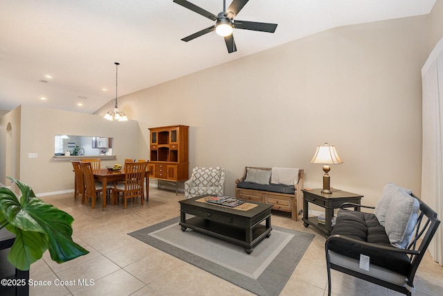 1869 Tullagee Ave, Melbourne, FL 32940 - living room with lofted ceiling, a ceiling fan, light tile patterned flooring, a chandelier, and recessed lighting