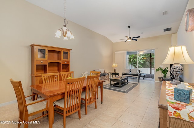 1869 Tullagee Ave, Melbourne, FL 32940 - dining space with ceiling fan, a chandelier, light tile patterned floors, and high vaulted ceiling