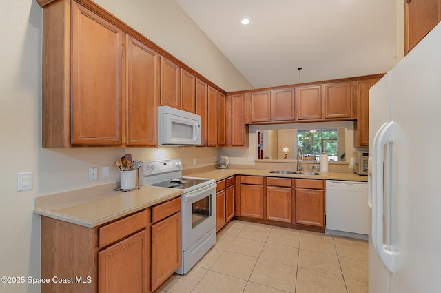 1869 Tullagee Ave, Melbourne, FL 32940 - kitchen featuring white appliances, light countertops, vaulted ceiling, light tile patterned floors, and brown cabinets