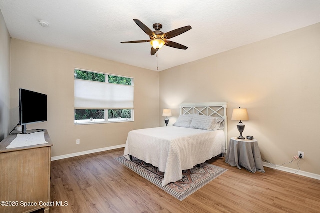 1869 Tullagee Ave, Melbourne, FL 32940 - bedroom with wood finished floors and a ceiling fan