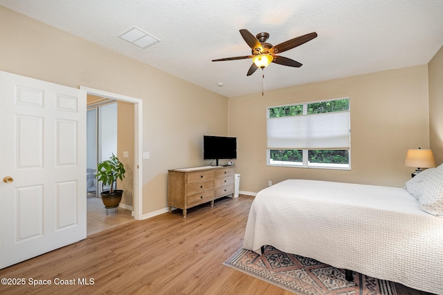 1869 Tullagee Ave, Melbourne, FL 32940 - bedroom featuring light wood-type flooring and ceiling fan