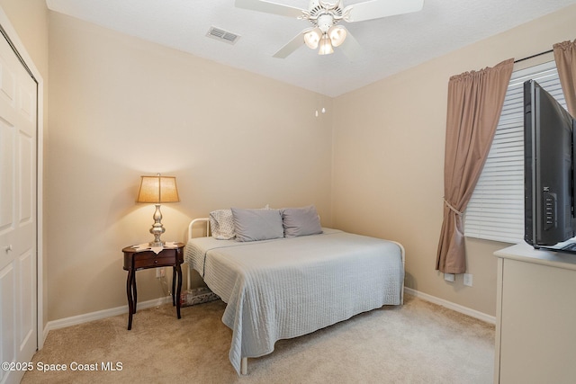 1869 Tullagee Ave, Melbourne, FL 32940 - bedroom with light carpet and a ceiling fan